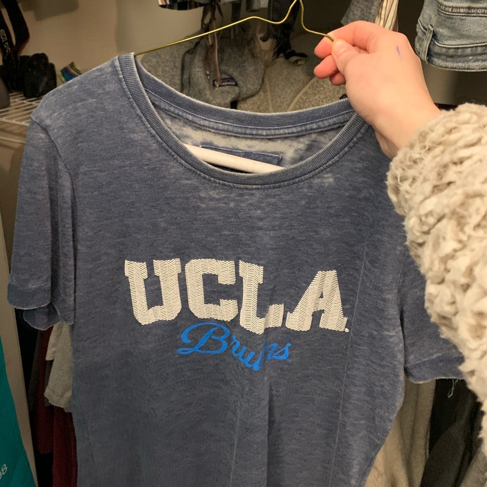 rustic looking UCLA tee